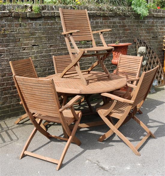 Circular teak garden tables & 6 carver chairs